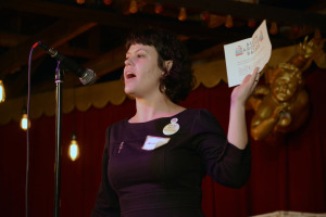Making announcements at the Austin Archives Bazaar in October 2014.
